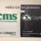 Zauberer TOMBECK vollführt faszinierende Bühnenshow auf der Weihnachtsfeier von cms it-consulting.